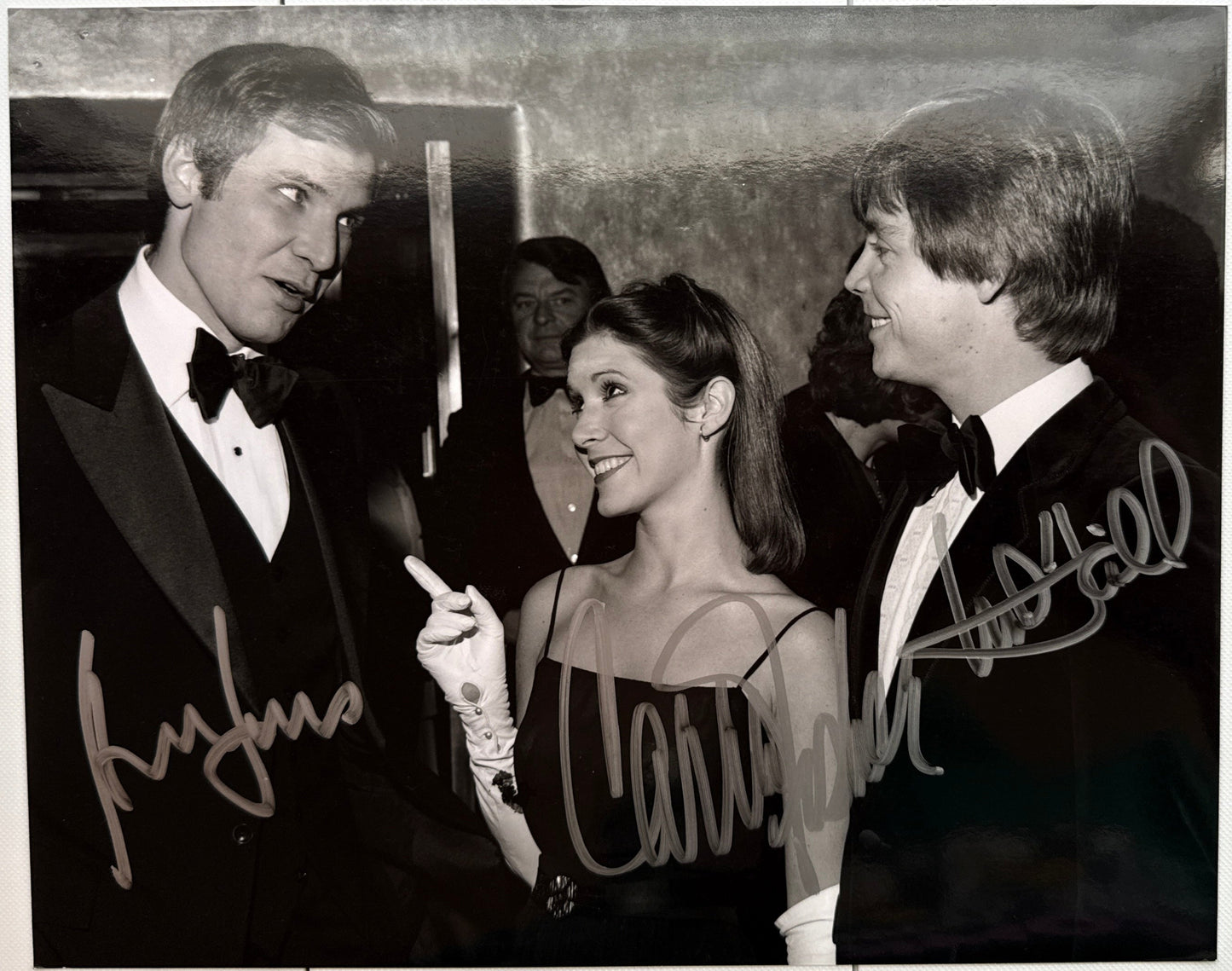 Harrison Ford & Carrie Fisher & Mark Hamill "Star Wars" triple signed 8x10 photo